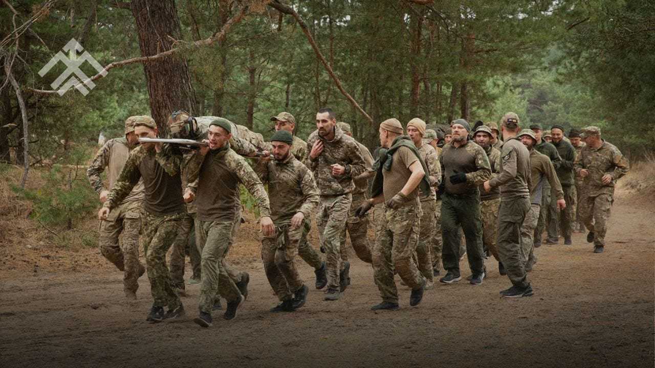 Нові бійці бригади «Хартія» Гвардії наступу отримали шеврони та прапор батальйону